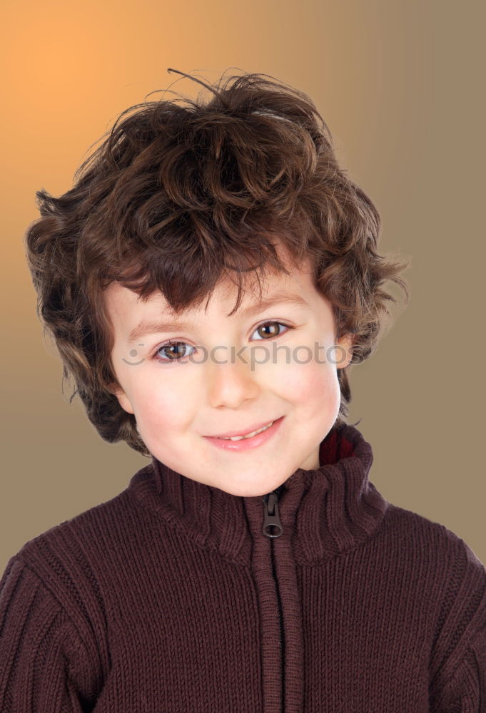 Similar – Small child with two years and curly hair looking at camera