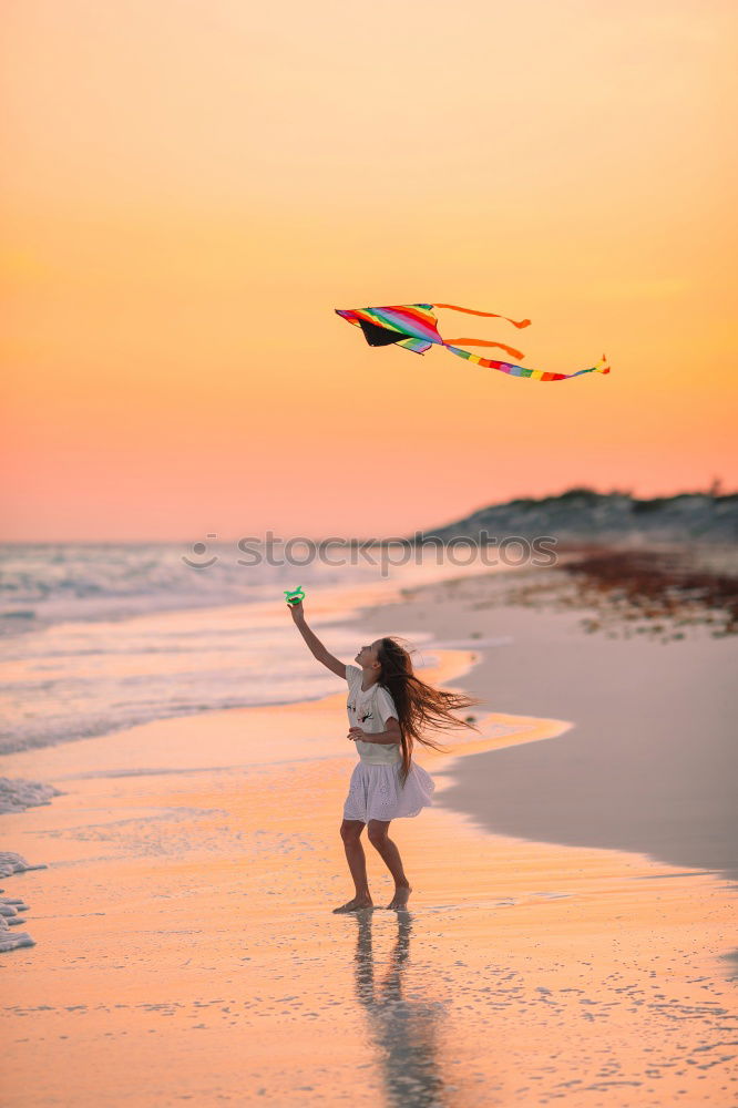 Similar – Father and son playing on the beach at the day time.