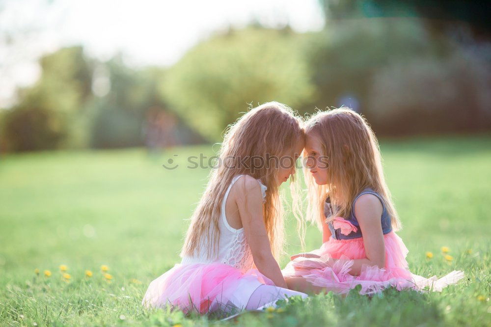 Similar – Image, Stock Photo happy siblings sitting in the field