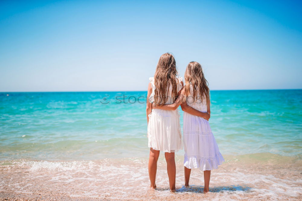 Similar – Happy children playing on the beach