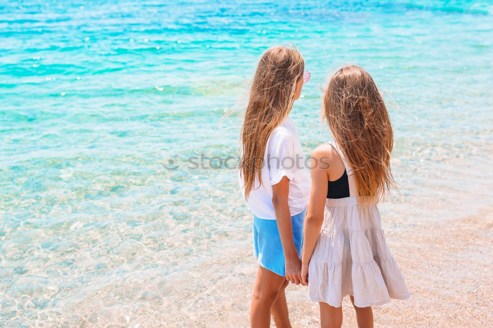 Similar – Happy children playing on the beach