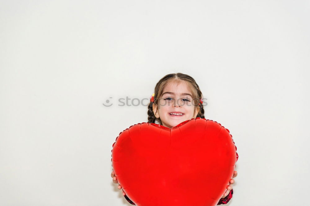 Similar – Image, Stock Photo smiling boy with a red heart