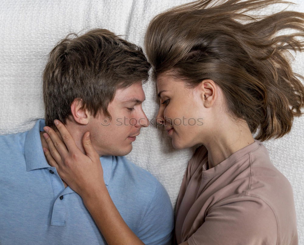 Similar – Young couple kissing through of glass car