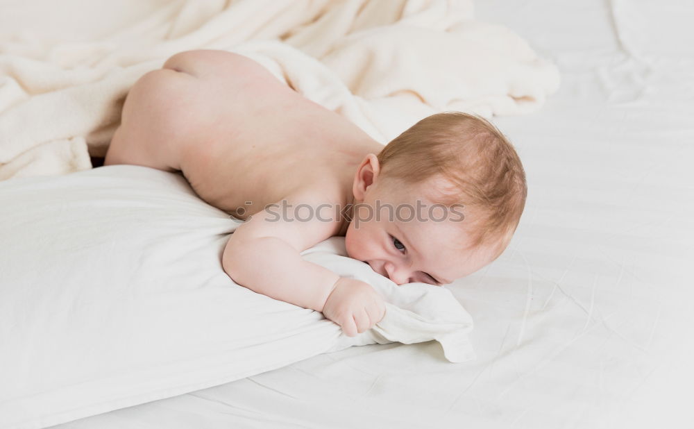 Similar – Cute Baby Girl Lying in the Crib