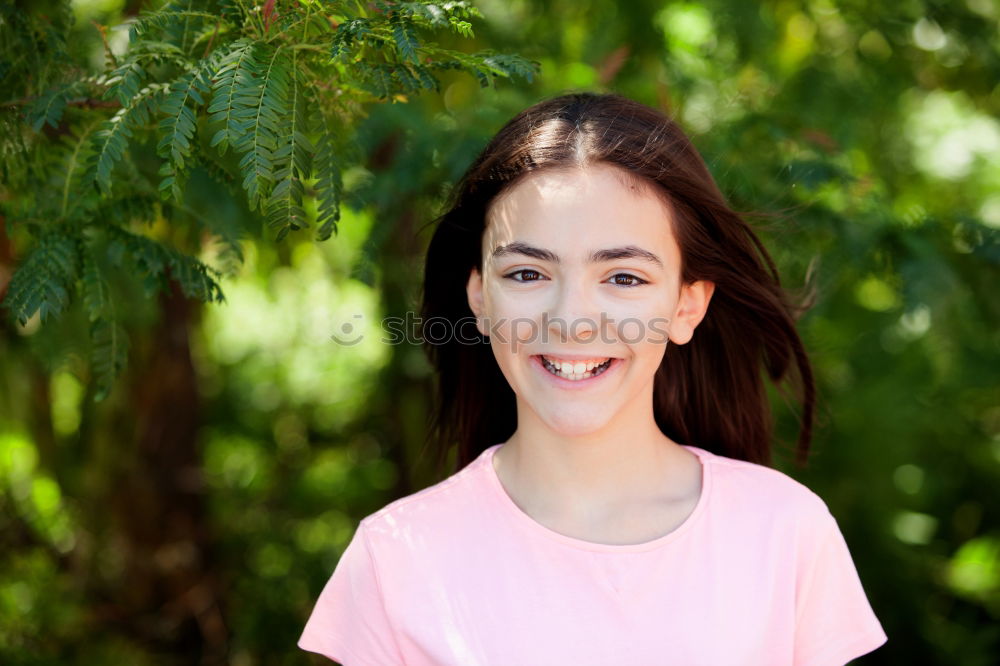 Similar – Happy preteen girl with blue eyes smiling