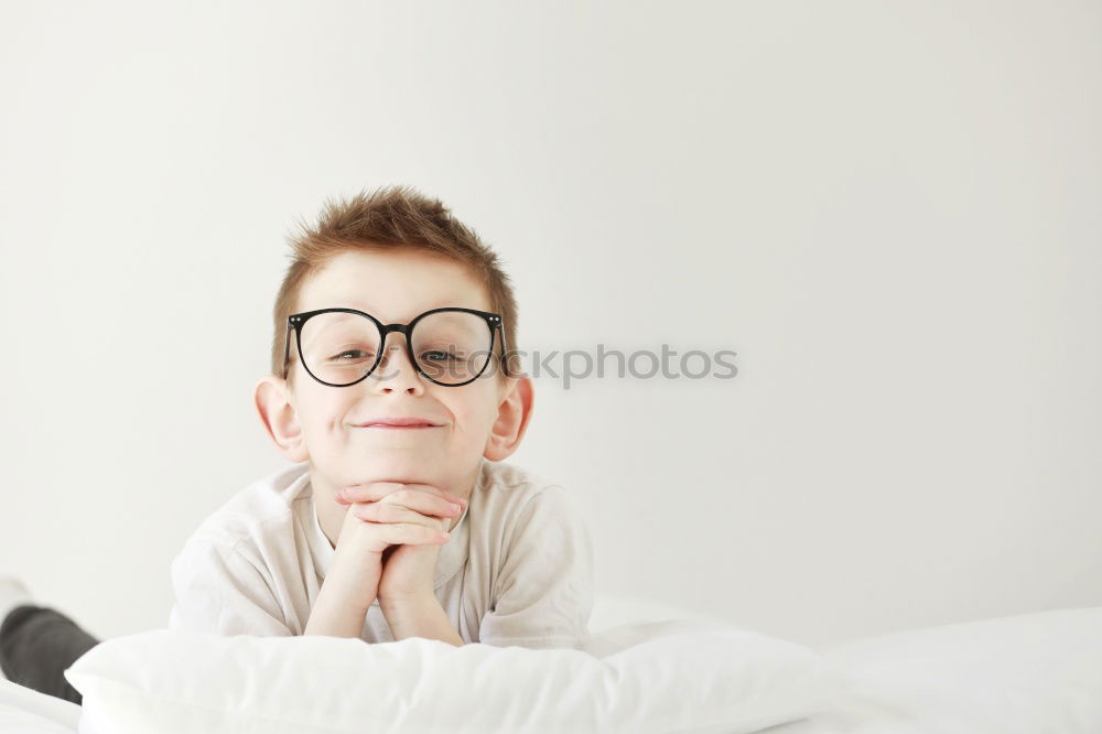 Similar – Image, Stock Photo Portrait of a young sad boy. Concept of loneliness.