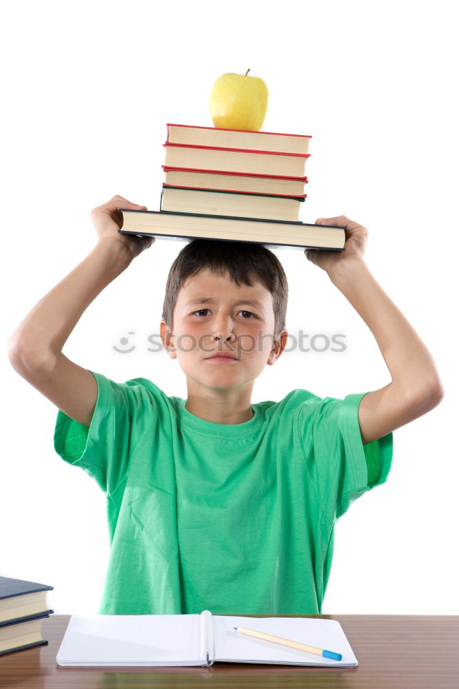 Similar – Young boy thinking about his homework