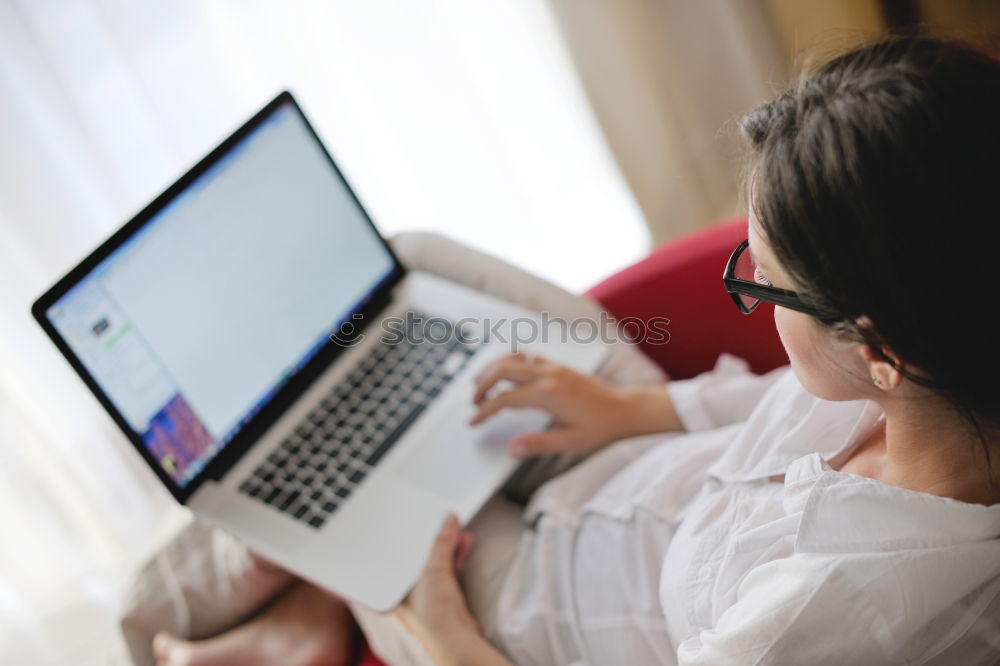 Similar – Two businessman meeting and using smartphone with laptop at outdoor cafe