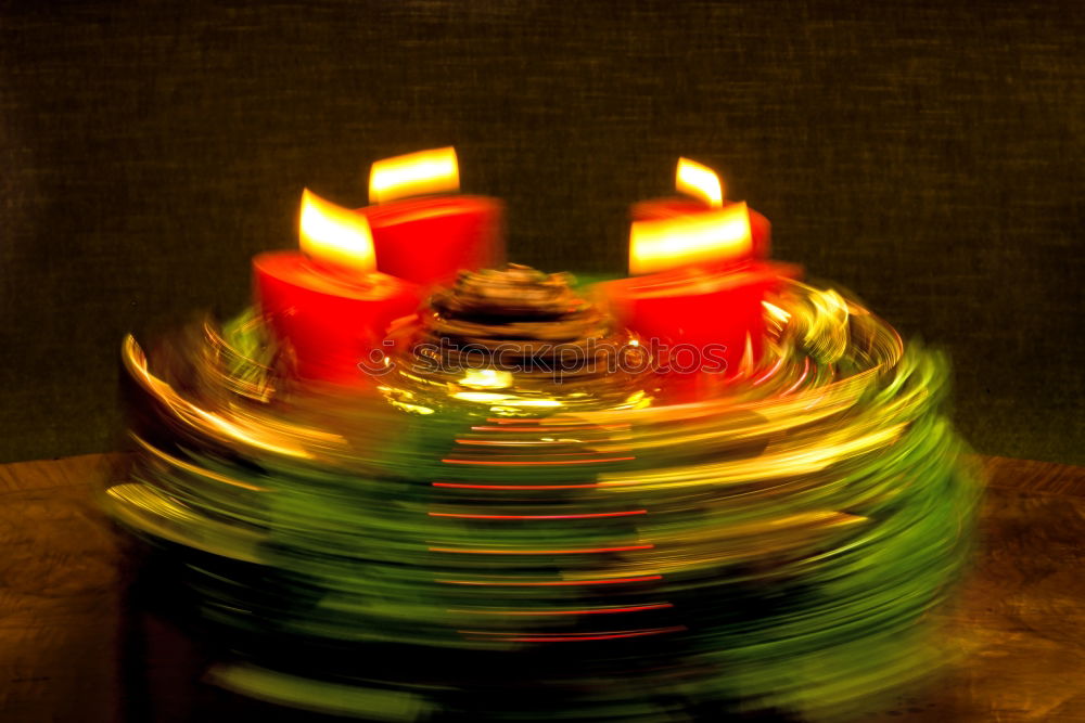 Similar – Image, Stock Photo two red burning candles stand one behind the other in front of a turquoise background