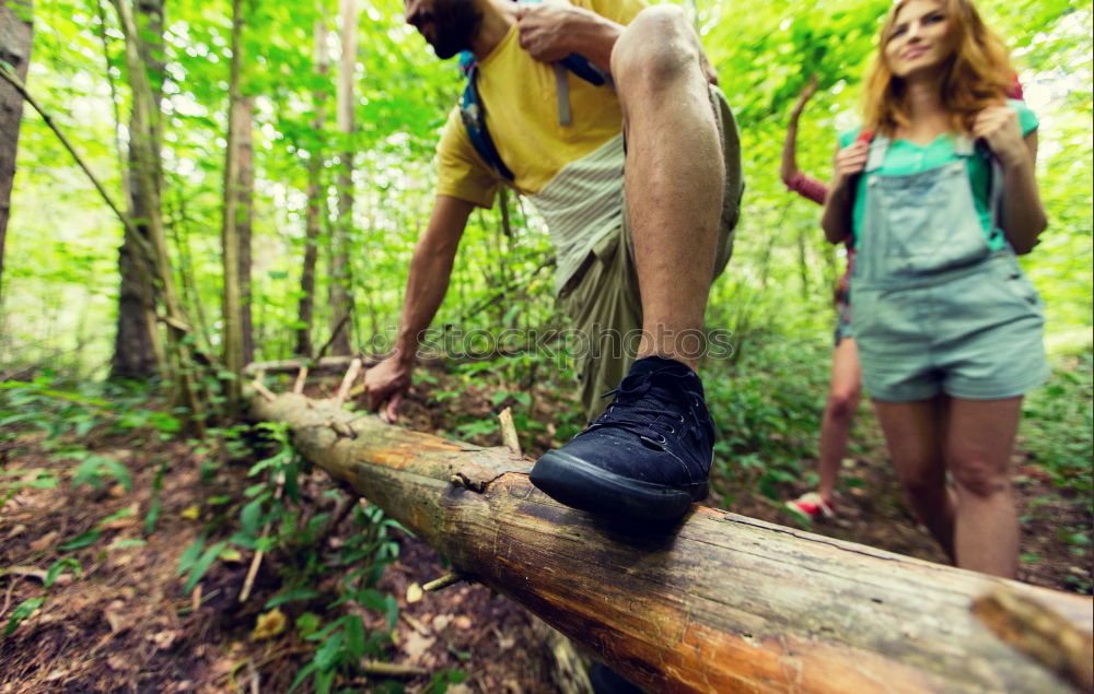 Similar – Image, Stock Photo Couple doing trekking looking with binoculars