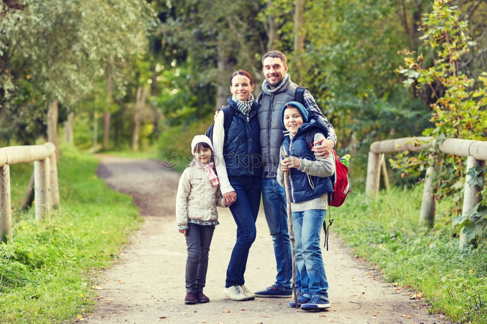 Similar – Image, Stock Photo Father and children walking on the road at the day time.