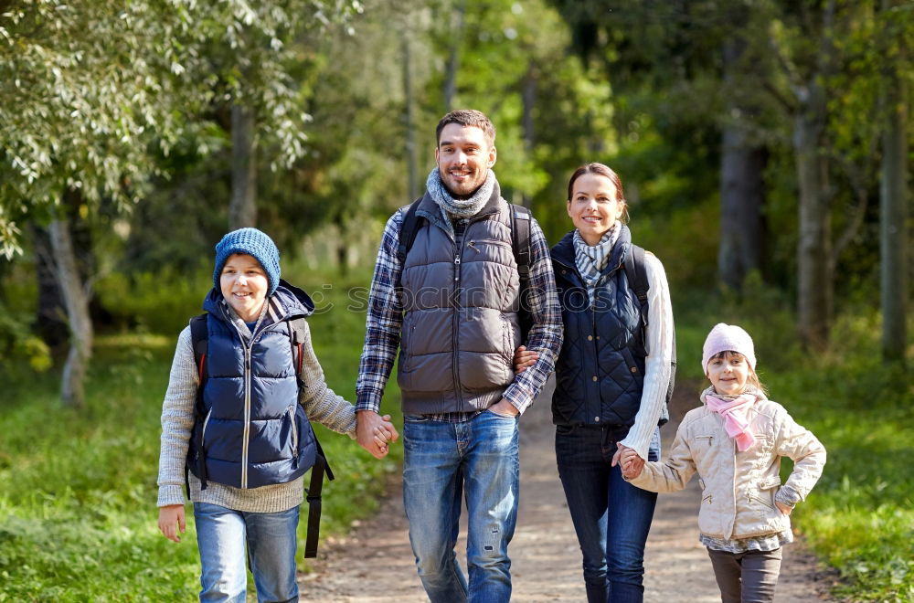 Similar – Image, Stock Photo Happy family enjoying together leisure in the forest