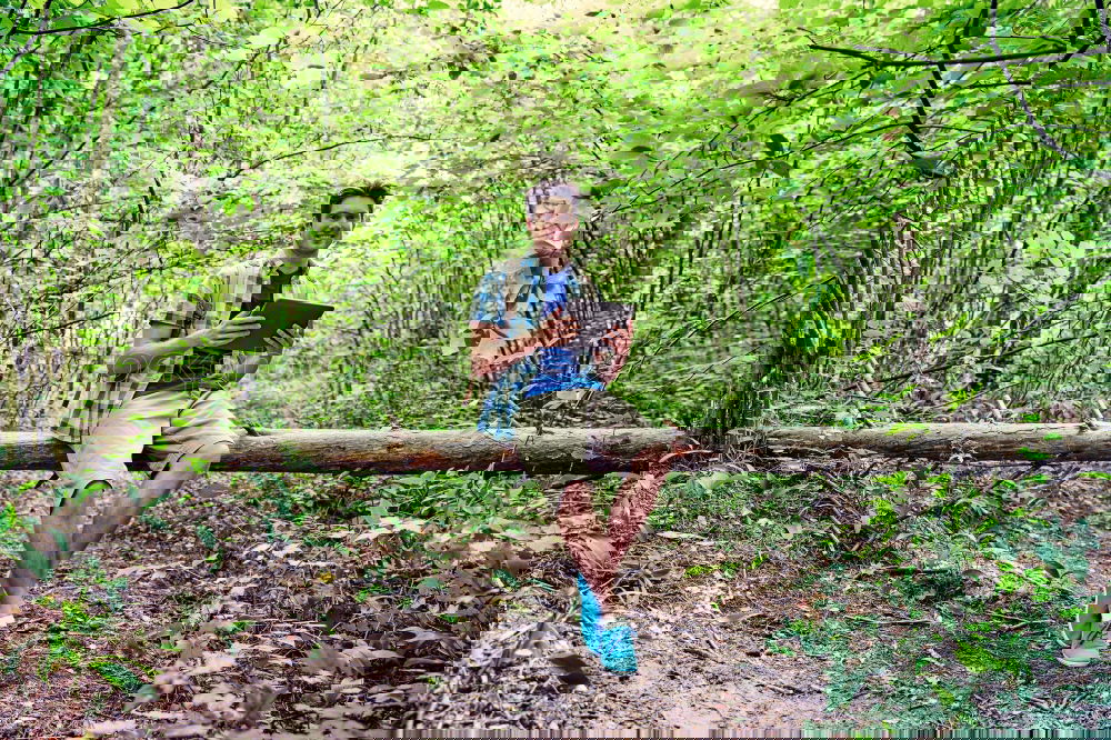 Similar – Image, Stock Photo Fit muscular man jogging on a rural trail