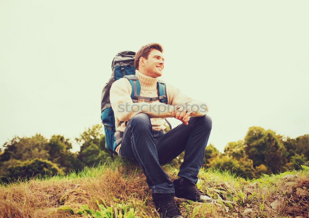 Similar – Image, Stock Photo Young man in a sunny autumn day