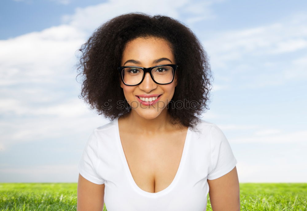 Similar – Beautiful African girl with curly hair on the rooftop