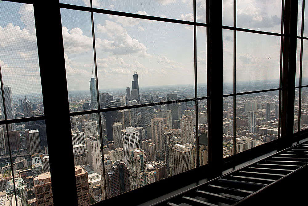 Similar – View out of the window of a high-rise building on the area around Frankfurt’s railway station