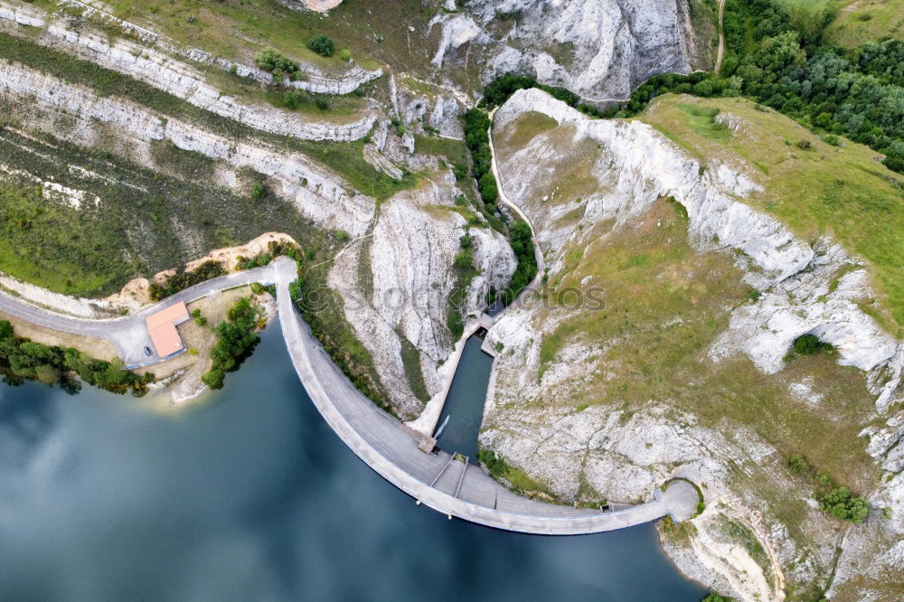 Similar – Aerial view of a road along the river