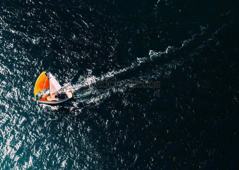 Similar – Sailing boat on blue Lake Garda II