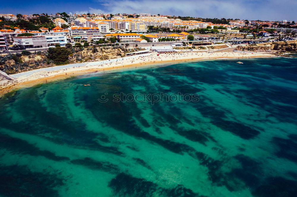 Similar – Scenic aerial view of city on ocean shore