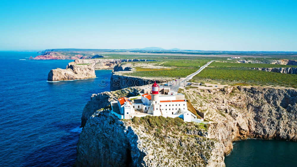 Similar – Wunderschöner Leuchtturm auf den hohen Klippen des Saint Vincent Kaps in der Algarve, Portugal