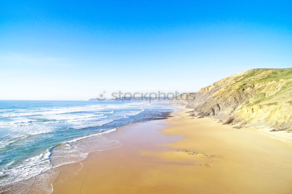 Summer Ocean Beach And Mountains Landscape In Portugal