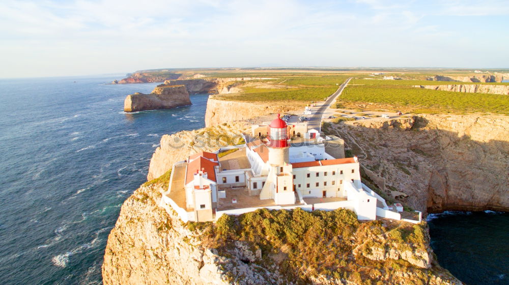 Similar – Wunderschöner Leuchtturm auf den hohen Klippen des Saint Vincent Kaps in der Algarve, Portugal