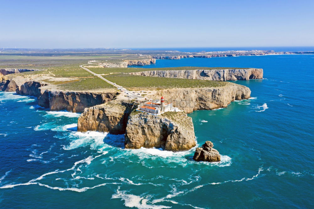 Similar – Wunderschöner Leuchtturm auf den hohen Klippen des Saint Vincent Kaps in der Algarve, Portugal