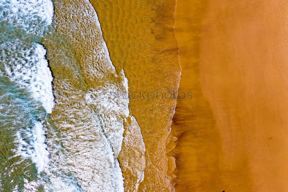 Similar – Image, Stock Photo Beautiful aerial view of a beach with waves