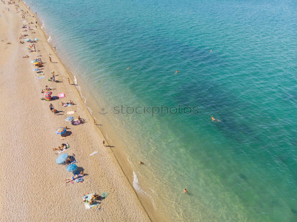 Similar – Image, Stock Photo Bird’s eye view of people on the beach