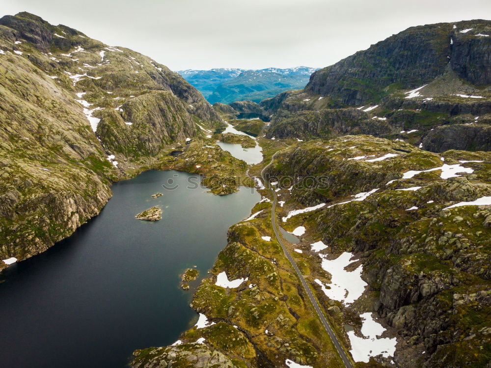 Similar – Image, Stock Photo Young woman in a red kayak, mountain lake panorama, Norway