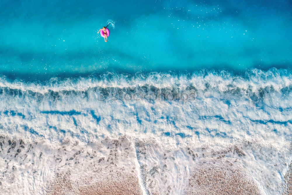 Similar – Boat anchors in rocky bay with turquoise blue sea from above