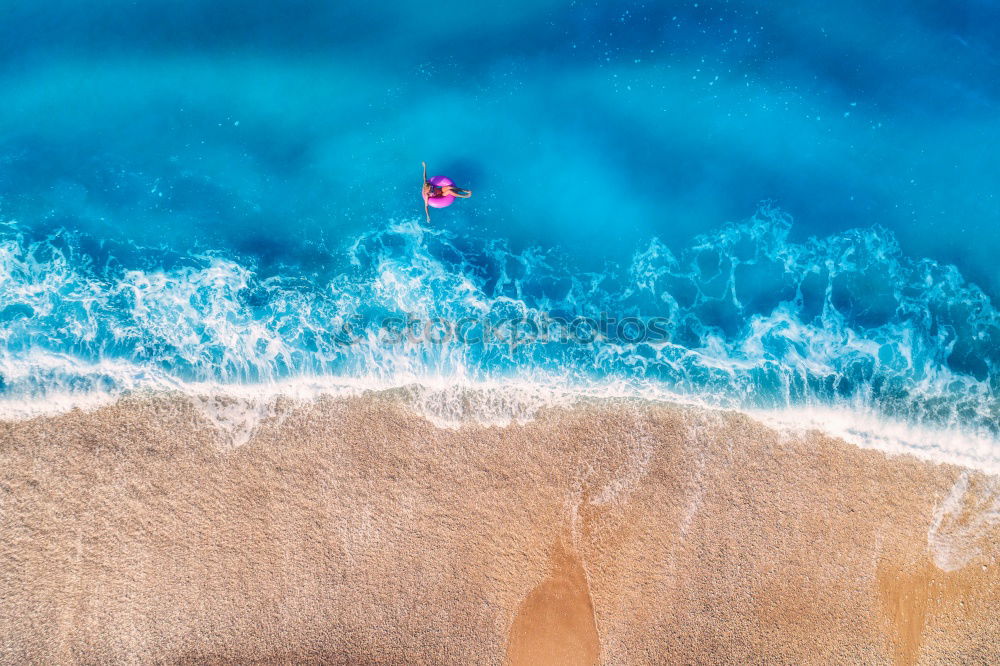 Similar – Lonely bay with white sand beach and turquoise sea from above