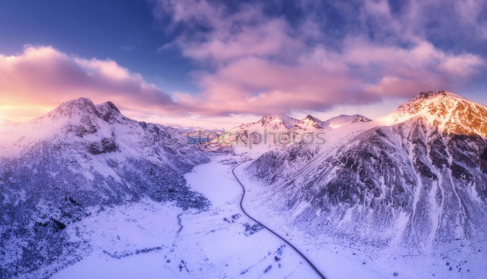 Similar – Sunset over the winter mountains