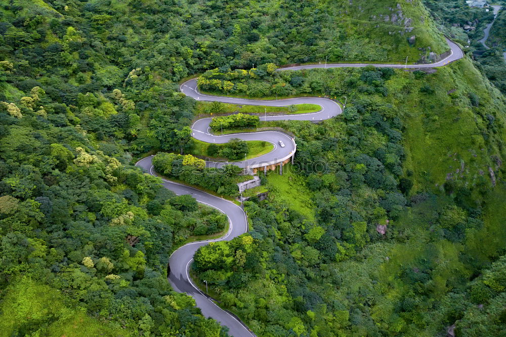 Similar – Image, Stock Photo Aerial top view top view of the road through the trees,