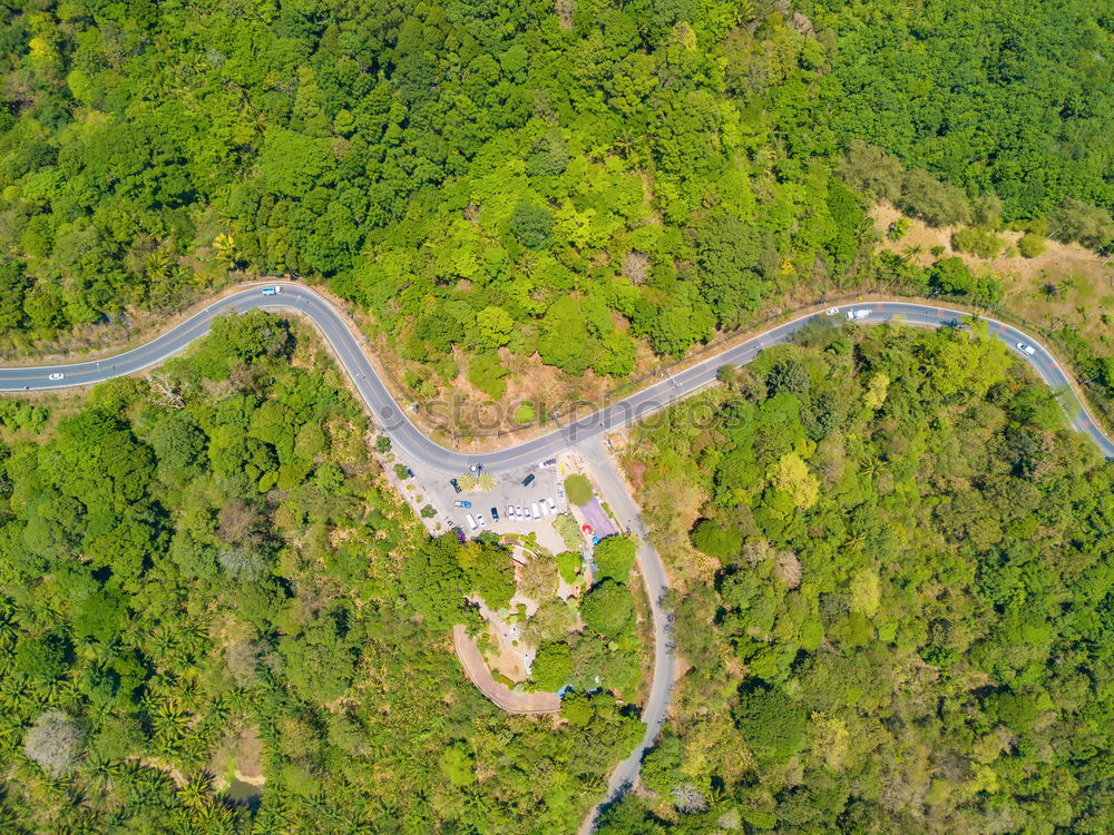 Similar – Image, Stock Photo Aerial top view top view of the road through the trees,