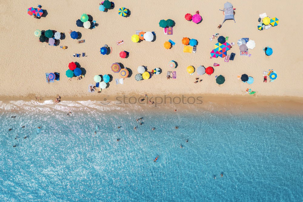 Similar – Image, Stock Photo Aerial View Of People Relaxing On Beach In Portugal