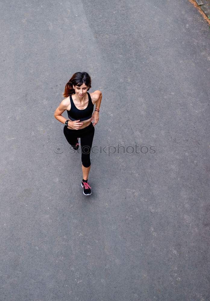 Image, Stock Photo Fit smiling young woman jumping rope