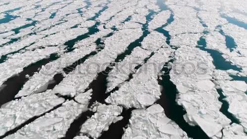 Similar – Ice floating in blue water