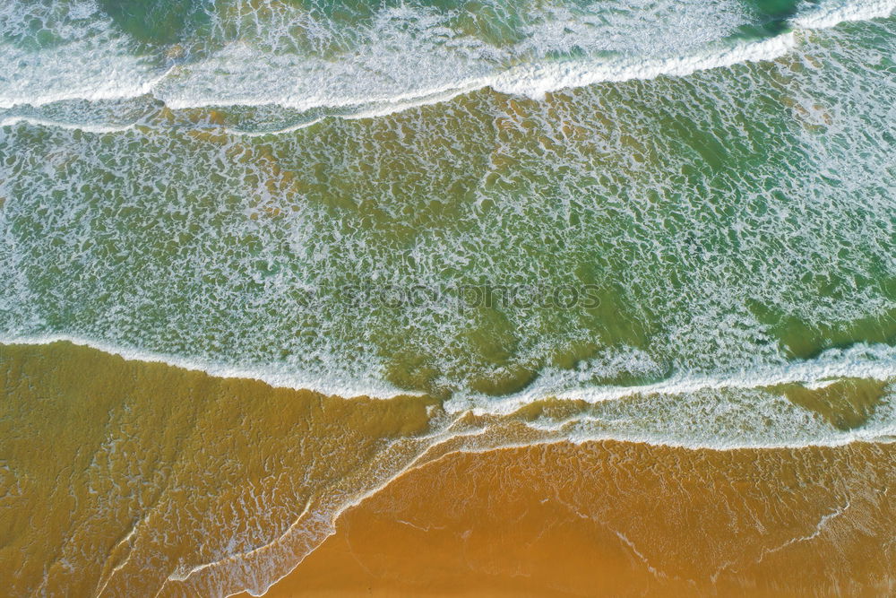 Similar – Aerial View From Flying Drone Of Ocean Waves On Beach