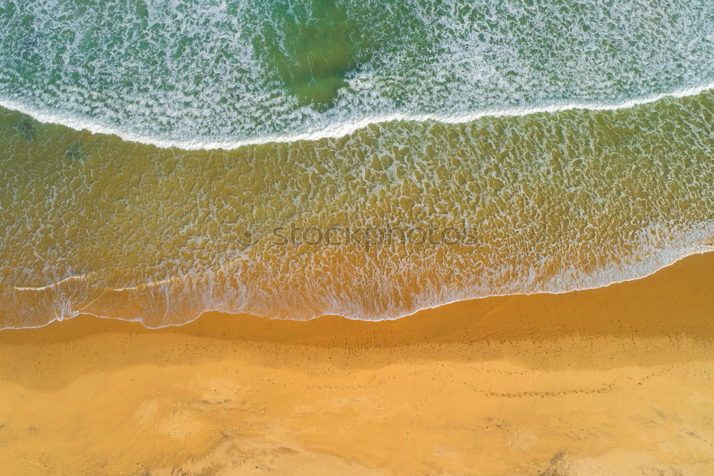 Similar – Image, Stock Photo Beautiful aerial view of a beach with waves