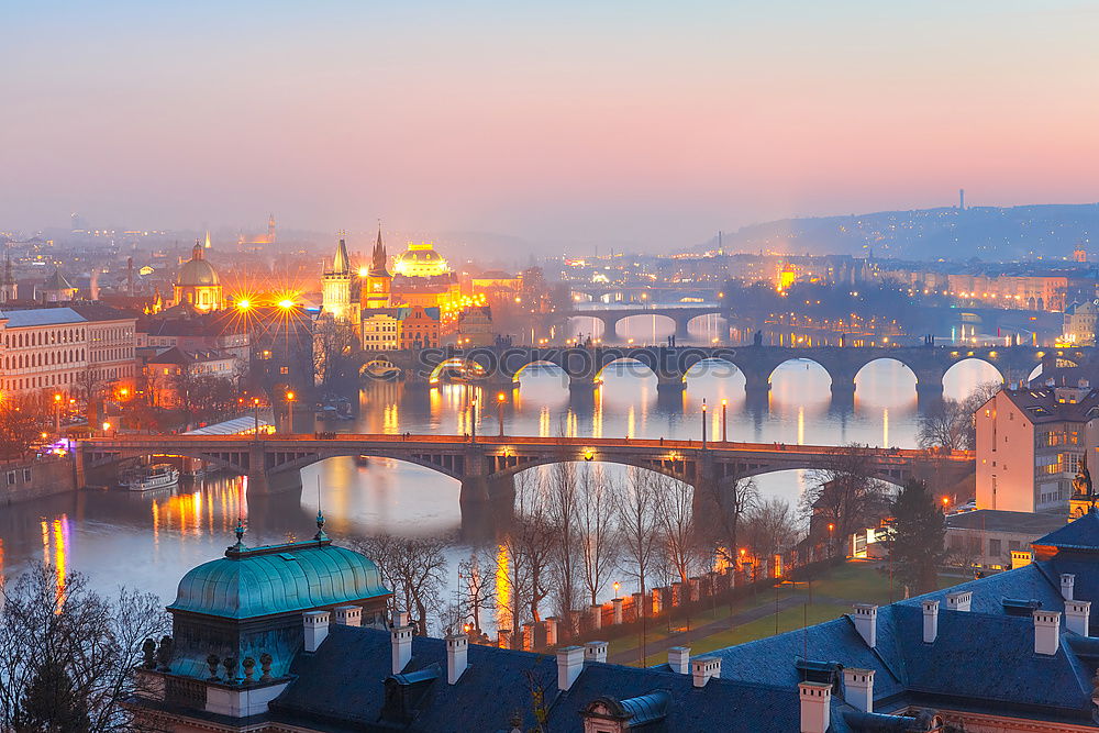 Similar – View of Prague’s old town with many bridges over the Moldau after sunset