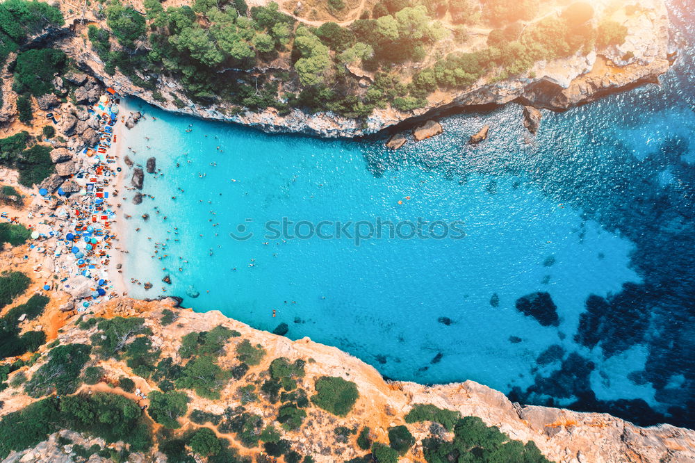 Similar – Lonely bay with white sand beach and turquoise sea from above