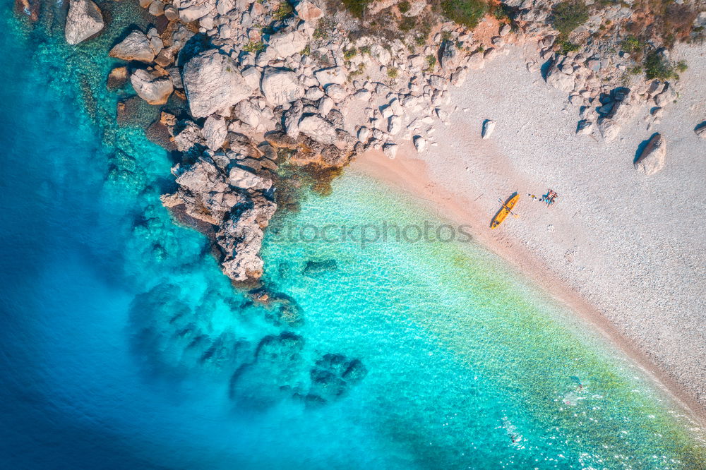 Similar – Boat anchors in rocky bay with turquoise blue sea from above