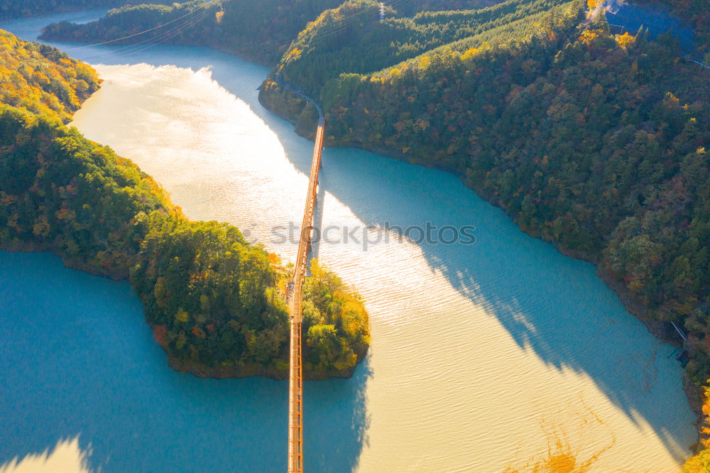 Similar – Sunny autumn day on the lake in mountains of south Austria