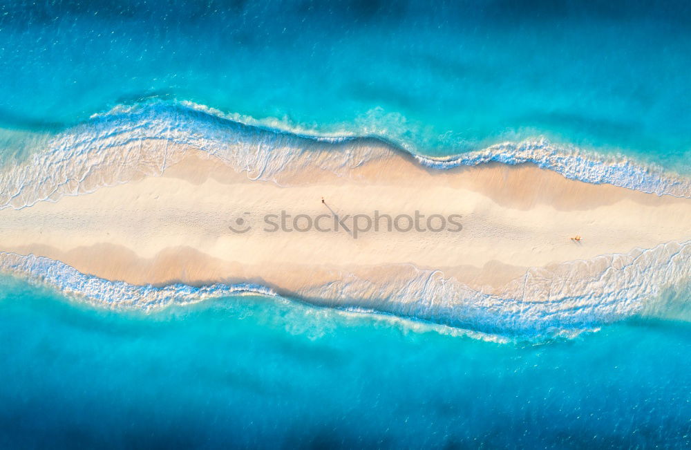 Similar – Image, Stock Photo Peninsula with rocks and beach in turquoise blue sea from above