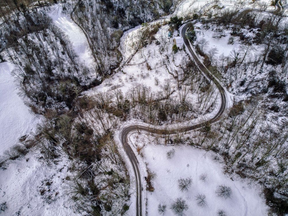 Similar – Image, Stock Photo Aerial landscape with meandering snowy winter mountain road with a moving truck