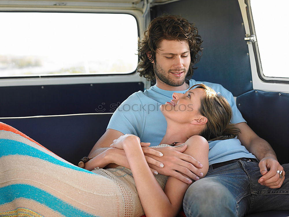 Similar – Image, Stock Photo Couple embracing in car