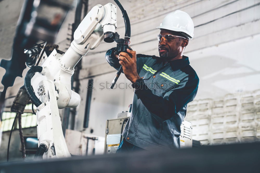 Similar – Image, Stock Photo Mechanic in his workshop taking tools