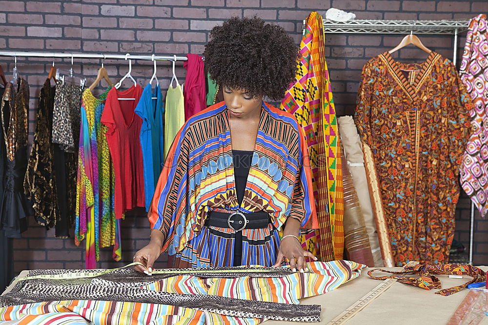 Similar – Image, Stock Photo Pretty sian woman in clothes store