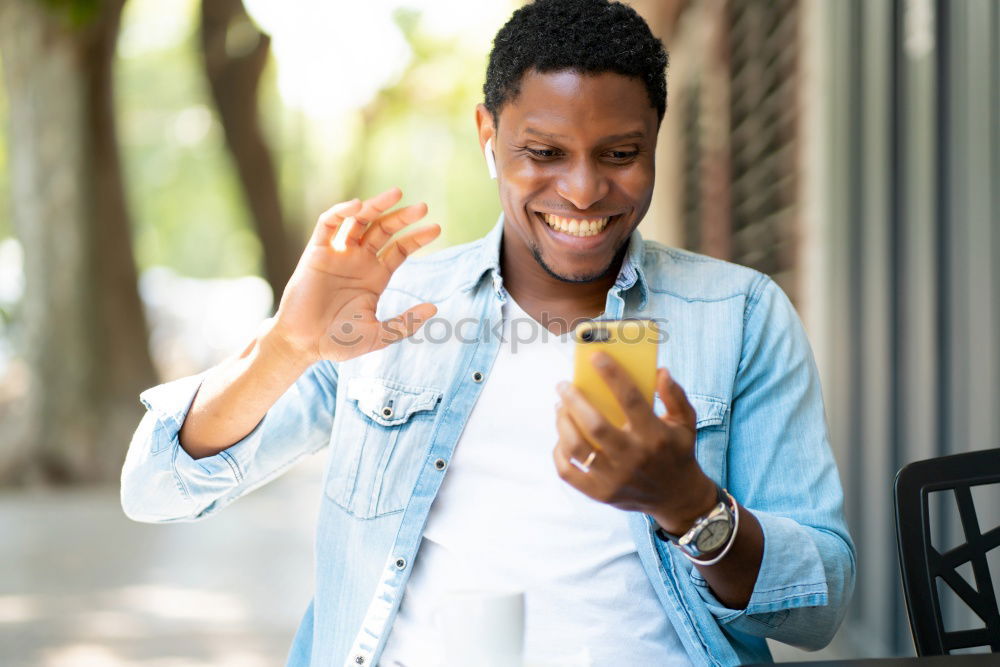 Similar – Image, Stock Photo American man using mobile in the street.